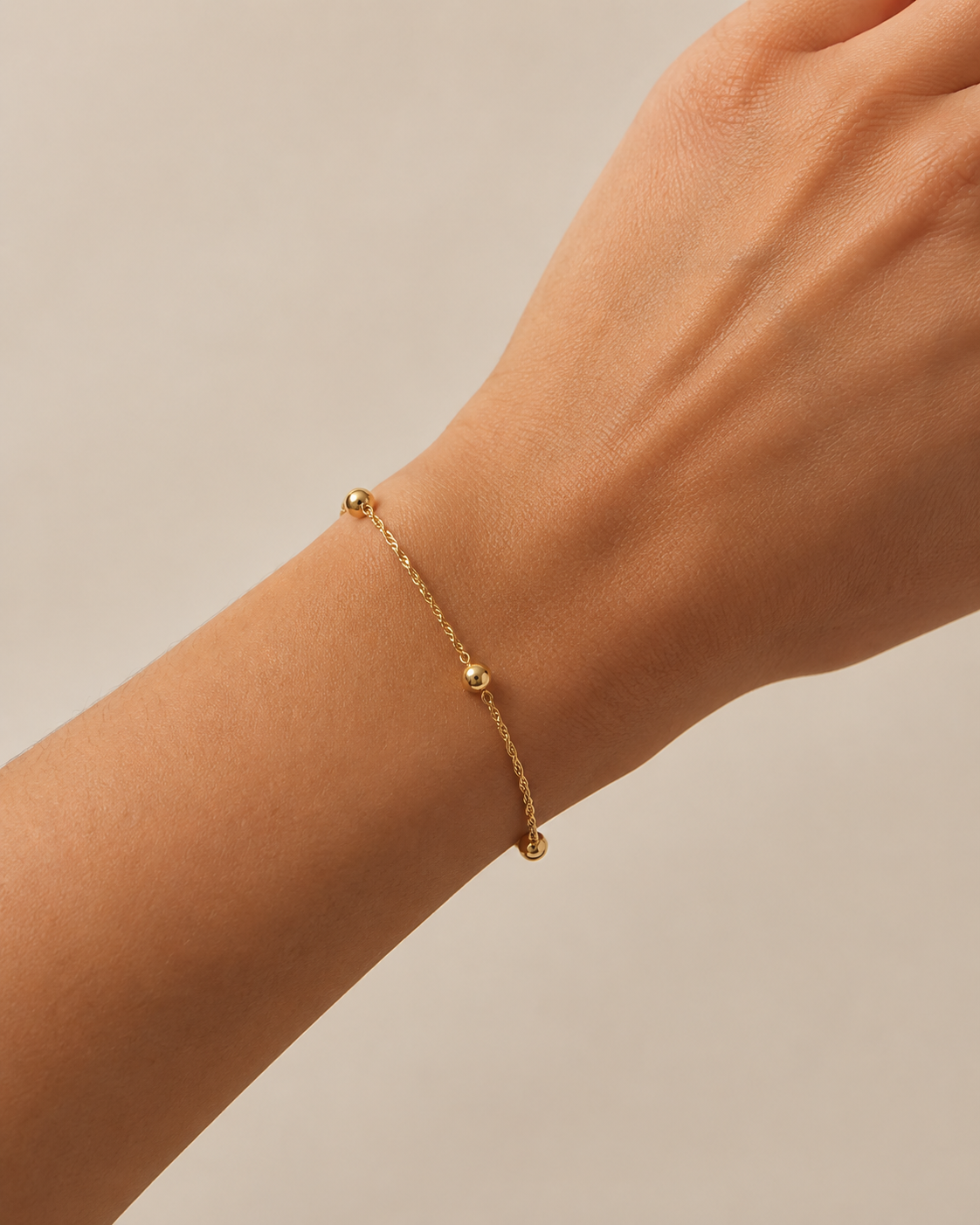 Pulseira esferas ouro 800