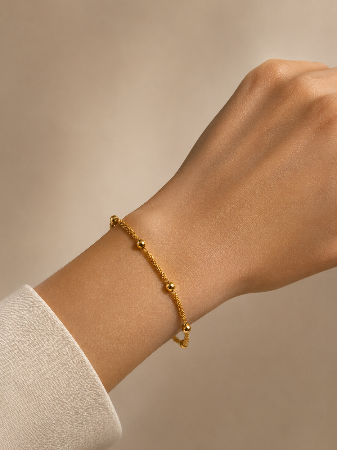 Pulseira esferas ouro 800