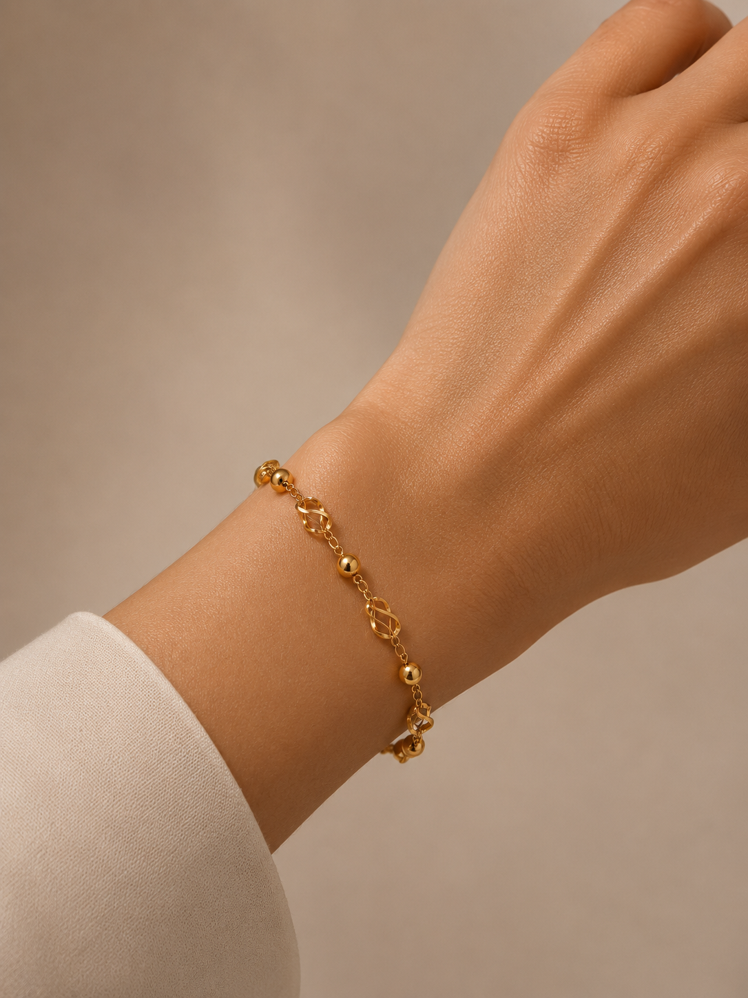 Pulseira esferas ouro 800